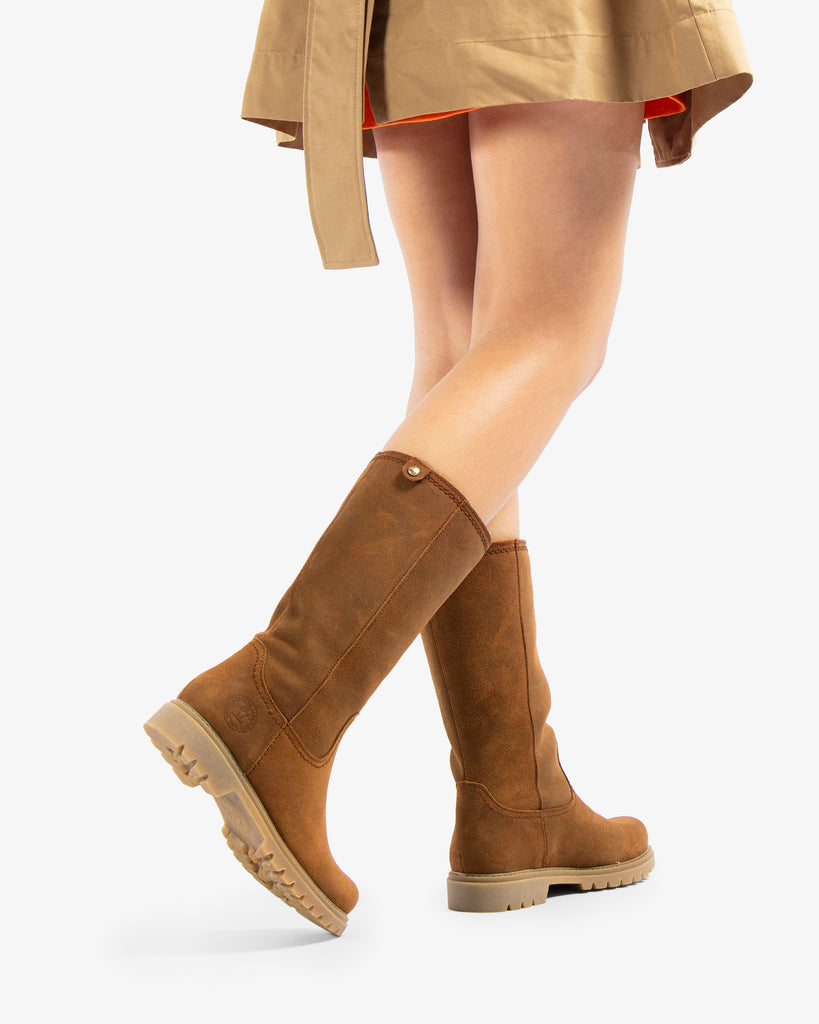 Bambina botas de piel con forro interior de pelo. cuero