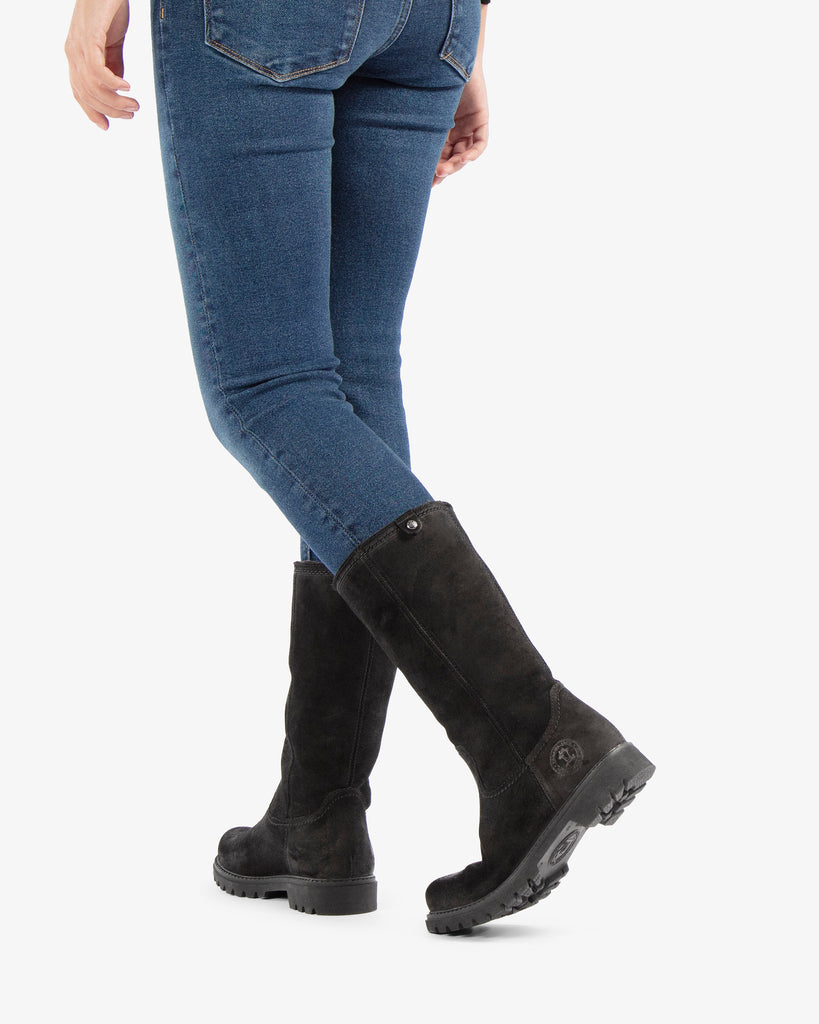 Bambina botas de piel con forro interior de pelo. negro