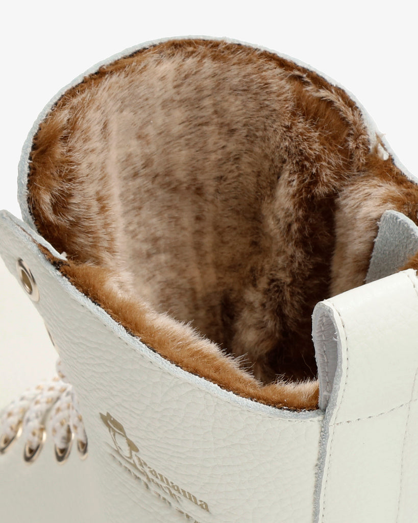 Frisia botas de piel con forro interior de pelo. blanco