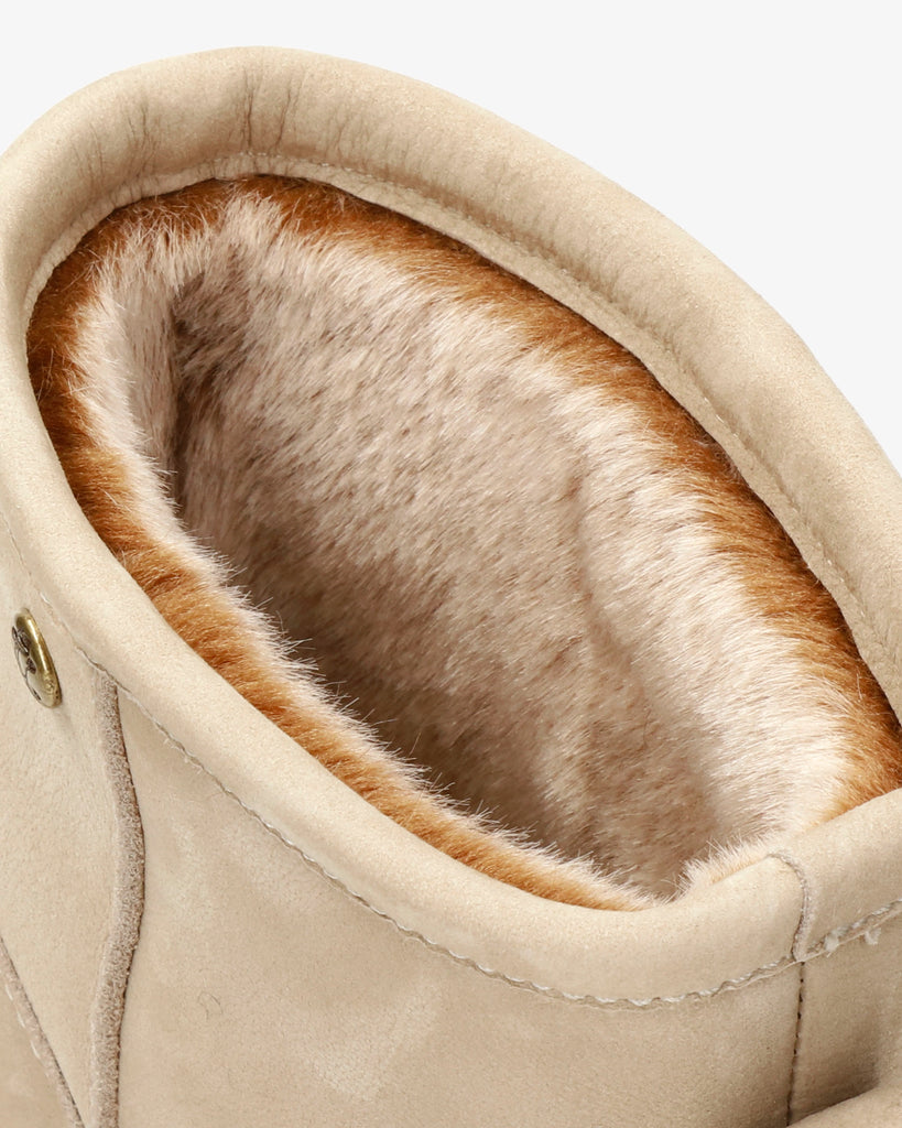 Grace botas de piel con forro interior de pelo. crudo