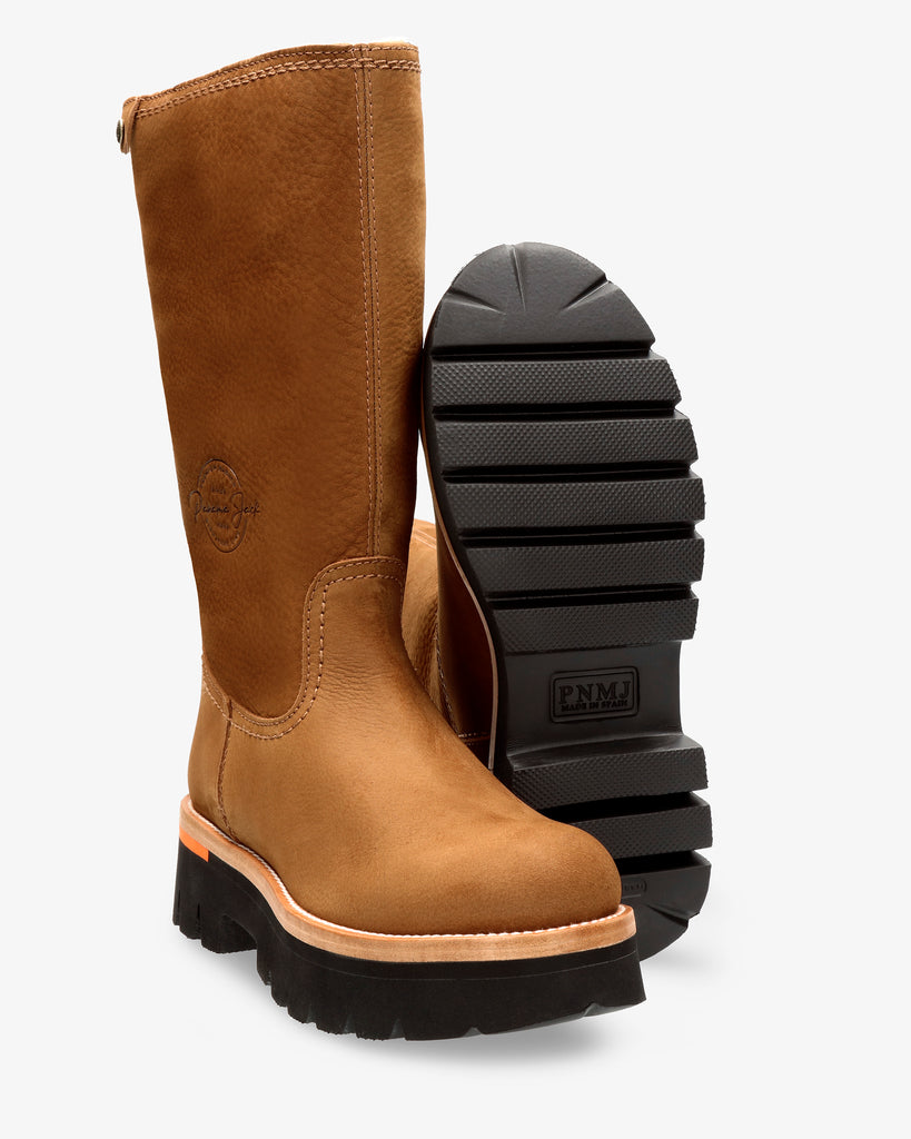 Lima botas de piel con forro interior de pelo. cuero