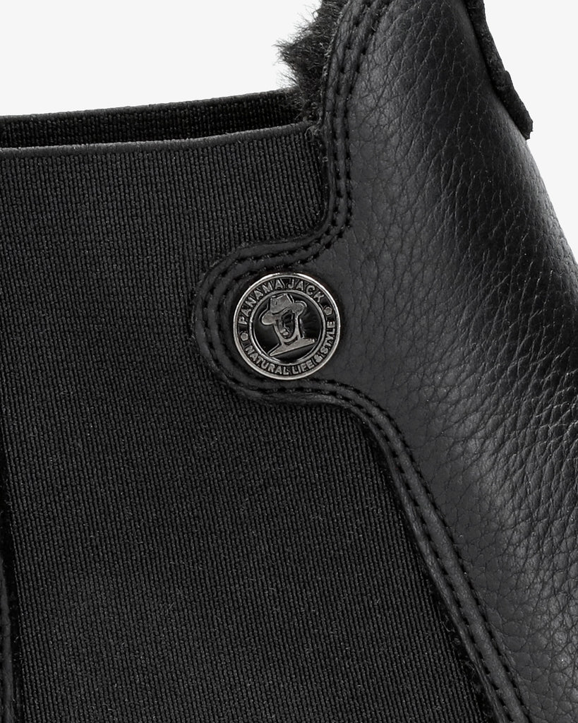 Nery Igloo botines de piel con forro interior de pelo natural. negro