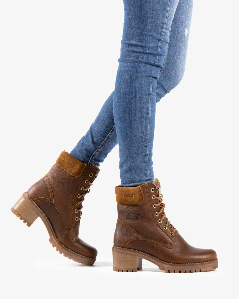 Phoebe botas de piel con forro interior de pelo. cuero