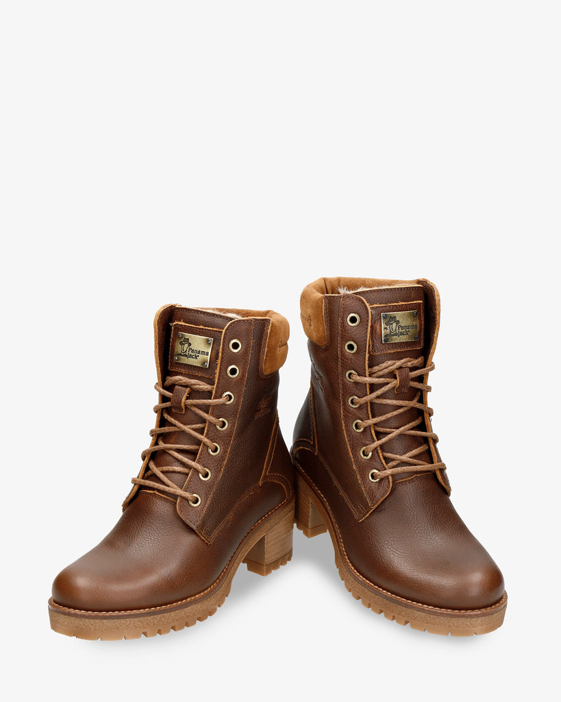 Phoebe botas de piel con forro interior de pelo. cuero