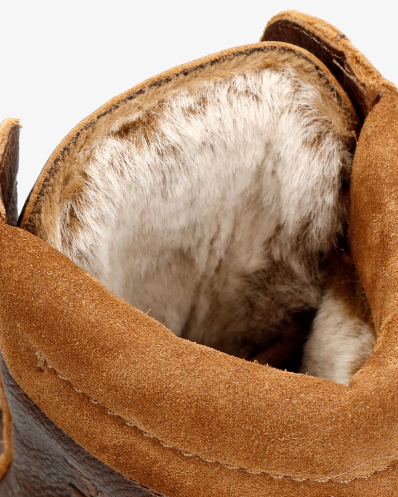 Phoebe botas de piel con forro interior de pelo. cuero