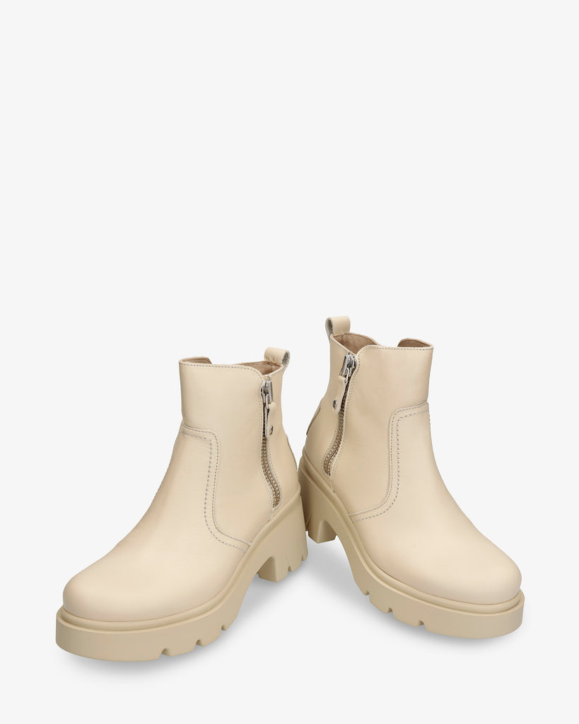 Phuket botín de piel con forro interior de pelo. crudo