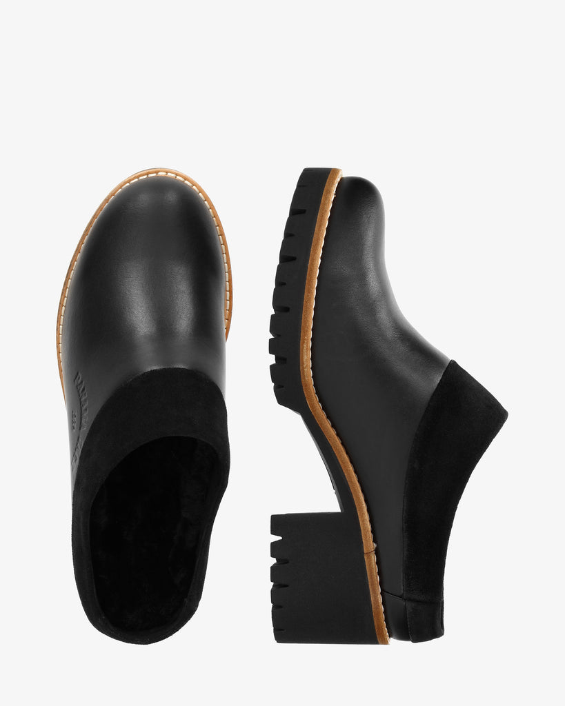 Priana Igloo zueco de piel con forro interior de pelo natural. negro