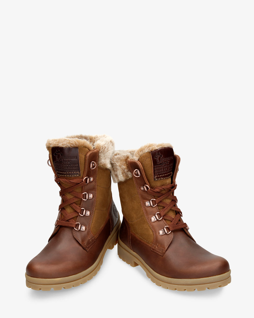 Tuscani botas de piel con forro interior de pelo. cuero